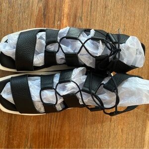 Arche Black Platform Gladiator Sandal.